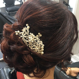 Bridal hair up image with flowers in hair